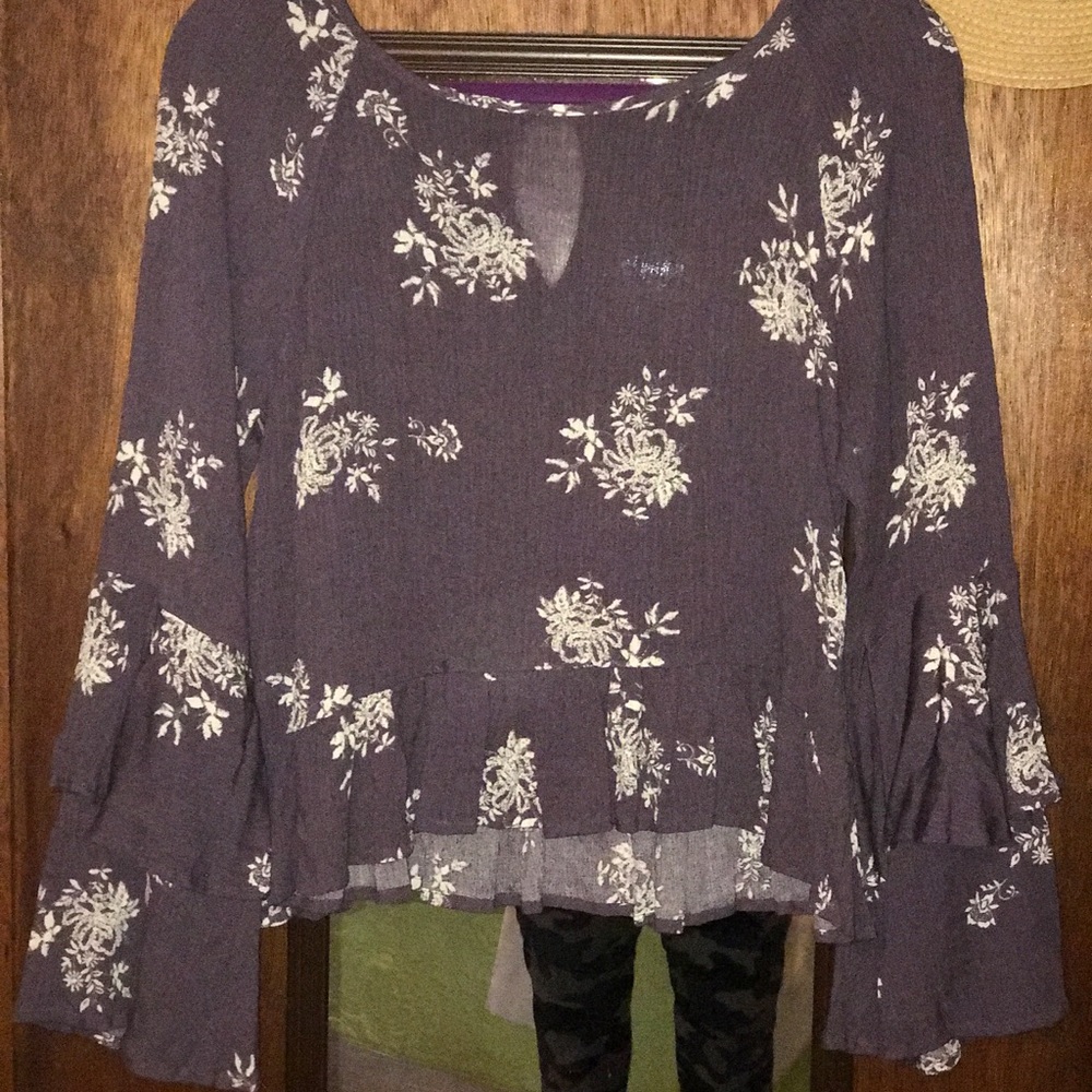 Reposting this top …These photos show a better look at this purple and white top